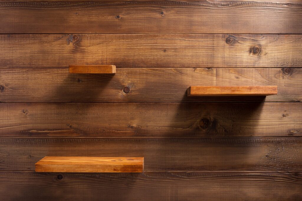 wooden shelves on rustic brown wood wall 2026 03 09 21 44 34 utc